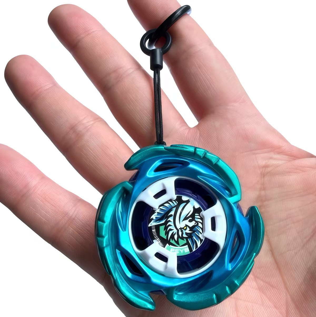 Beyblade keychain held in hand showing size of the mounted blade