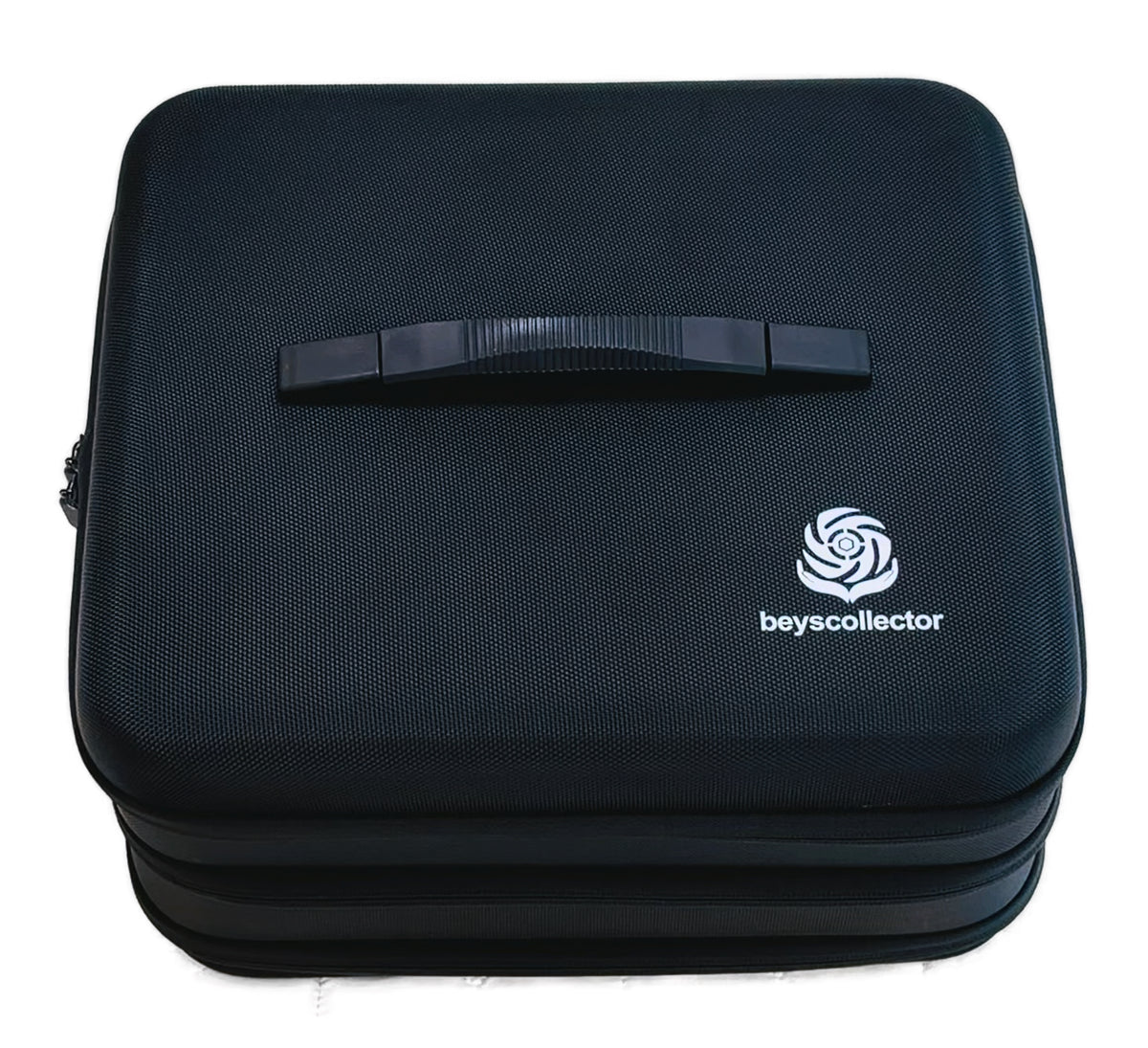 Closed black Beyscollector hard shell Beyblade case with carry handle
