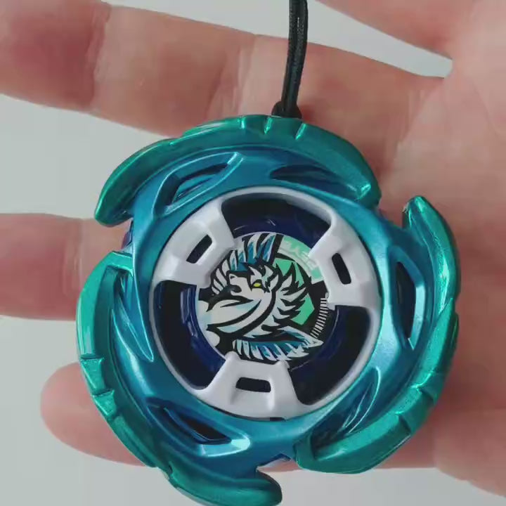 Video showing the Beyblade keychain free-spinning and the bit locking opening on the back plate